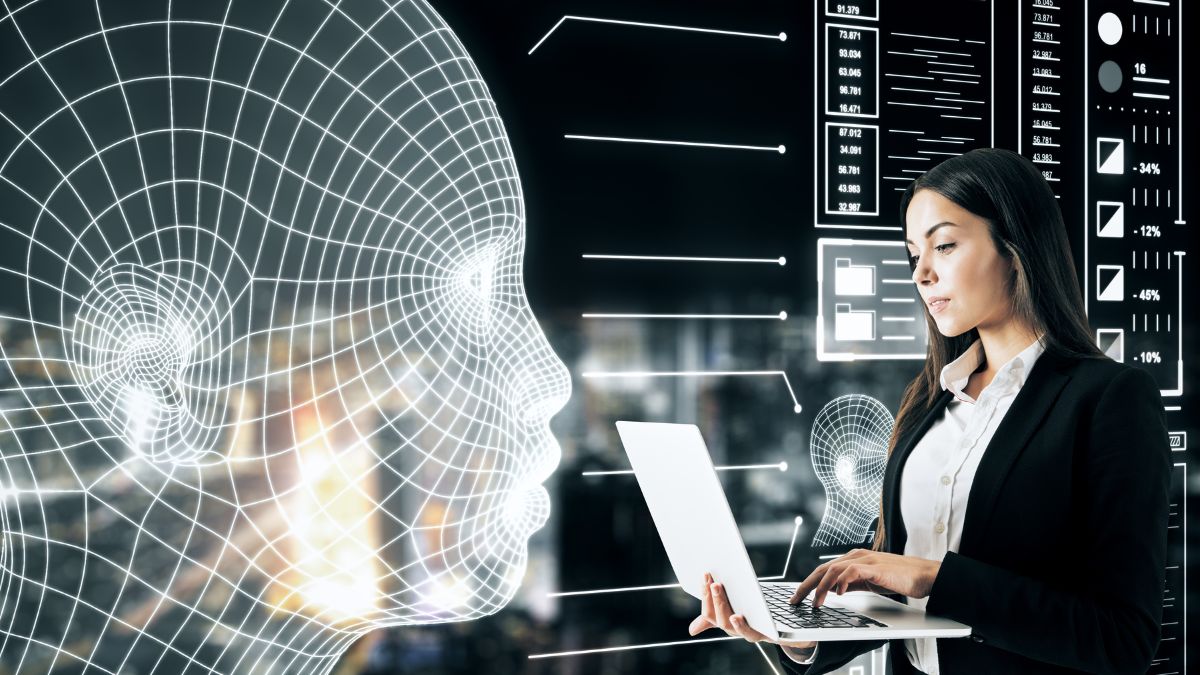 A photo of a woman holding a laptop while facing an AI head