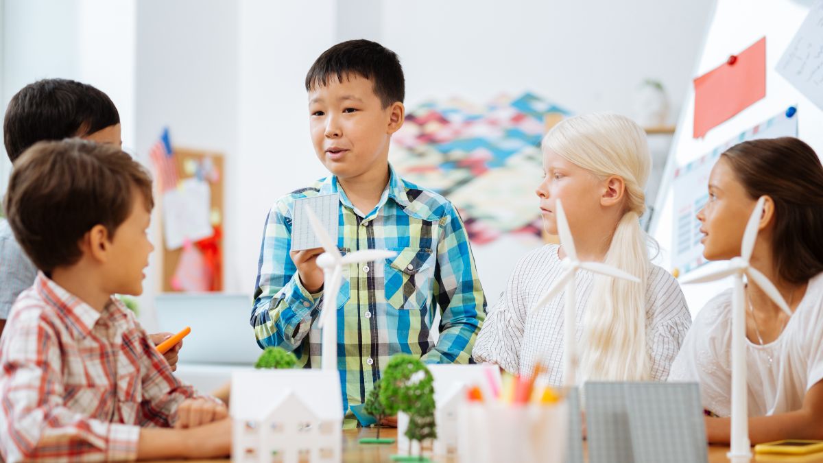 A student speaking to his classmates