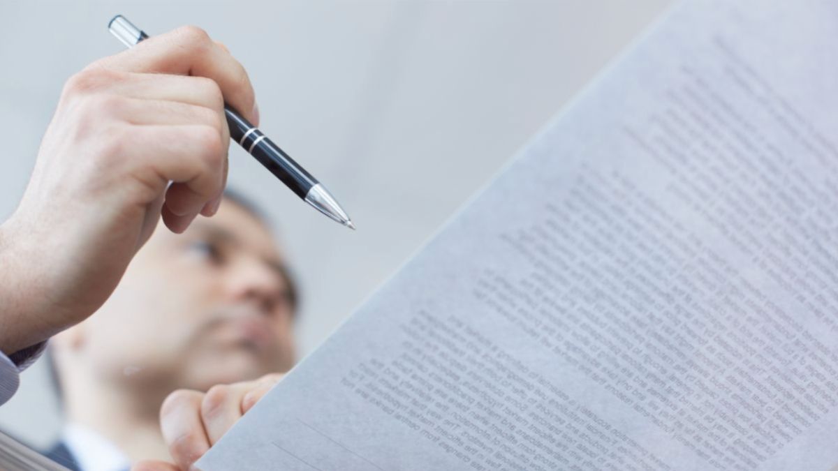 A man going over a document